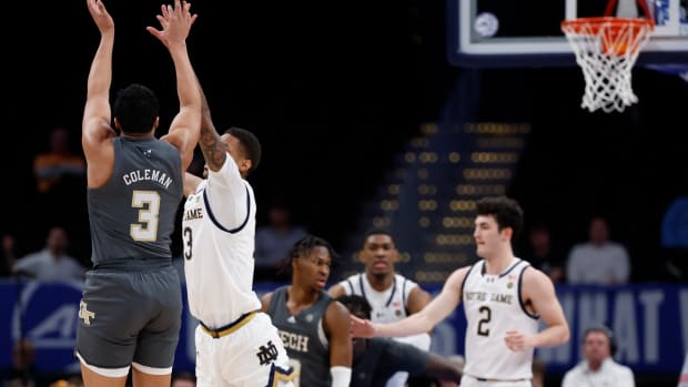 Mar 12, 2024; Washington, D.C., USA; Georgia Tech Yellow Jackets guard Dallan Coleman (3) shoots the ball as Notre Dame Fighting Irish forward Tae Davis (13) defends in the second half at Capital One Arena. Mandatory Credit: Geoff Burke-USA TODAY Sports